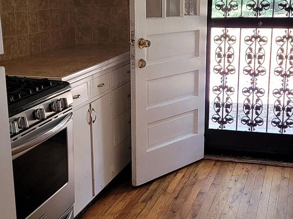 One side of the galley style kitchen