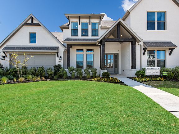 Photo of previously built Paloma plan. Brick color, elevation and interior selections will differ.