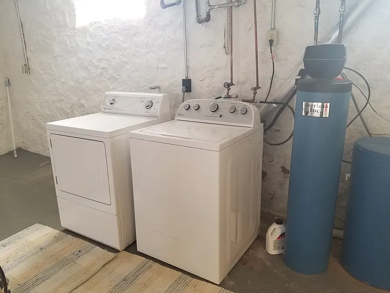 Laundry area, located in the basement