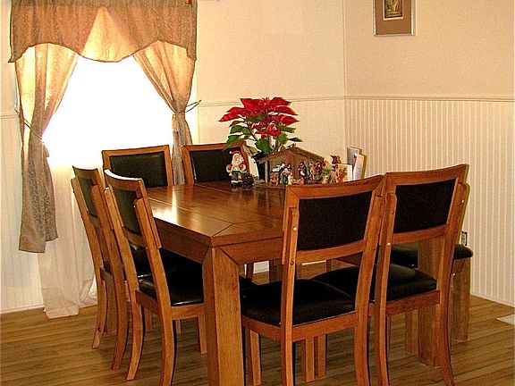 LARGE DINING ROOM WITH PLENTY OF LIGHT