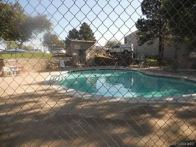 Building Photo - 3550 S Harlan St #288