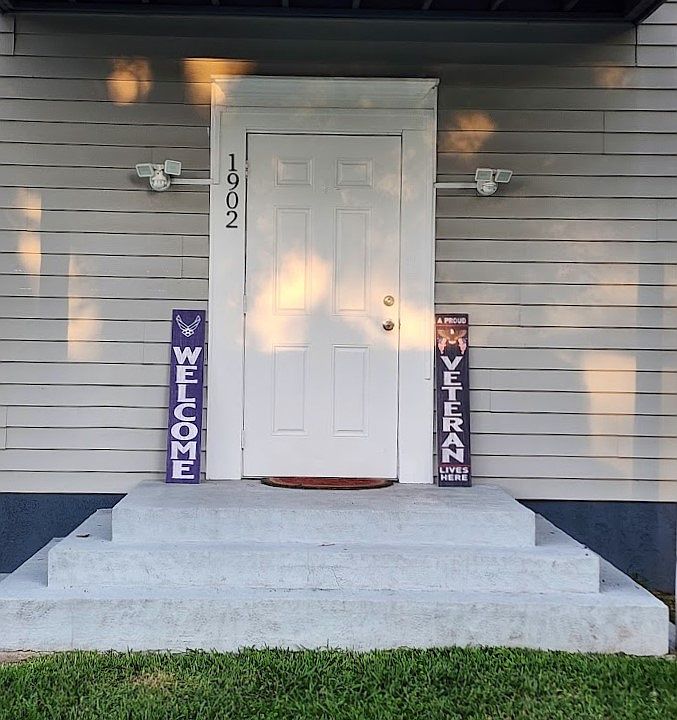 Covered Entrance and Security Lights.