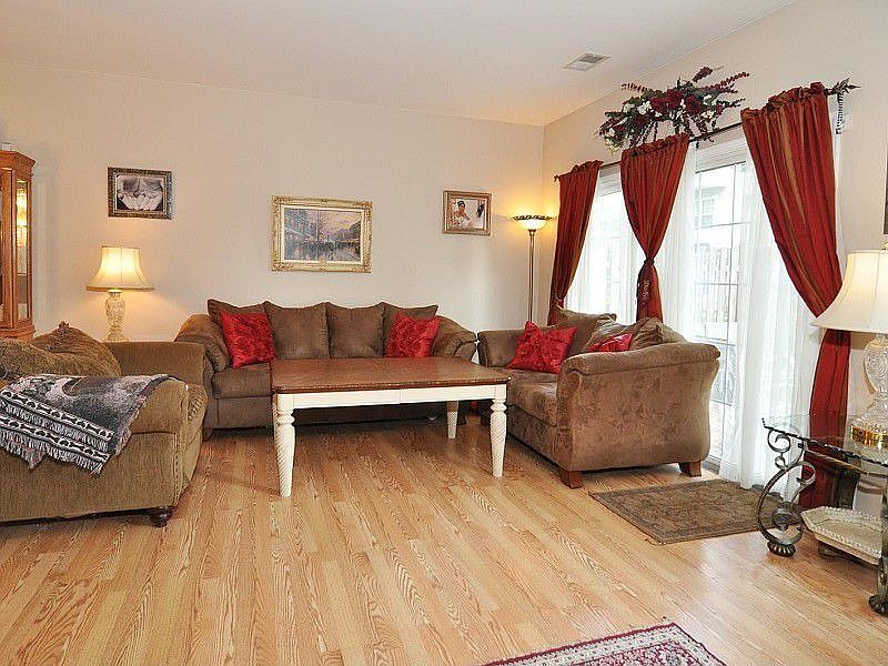 LIVING ROOM WITH DOORS TO PATIO