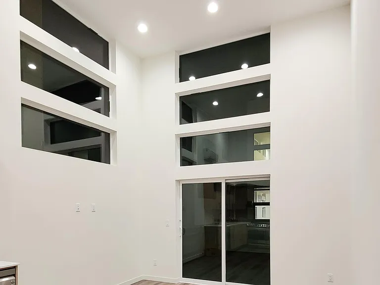 Living room (2nd floor); high ceiling.