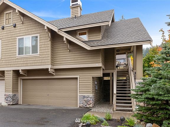 Two car garage for all your enclosed storage needs. Note the additional semi-enclosed storage space under the deck and stairwell.