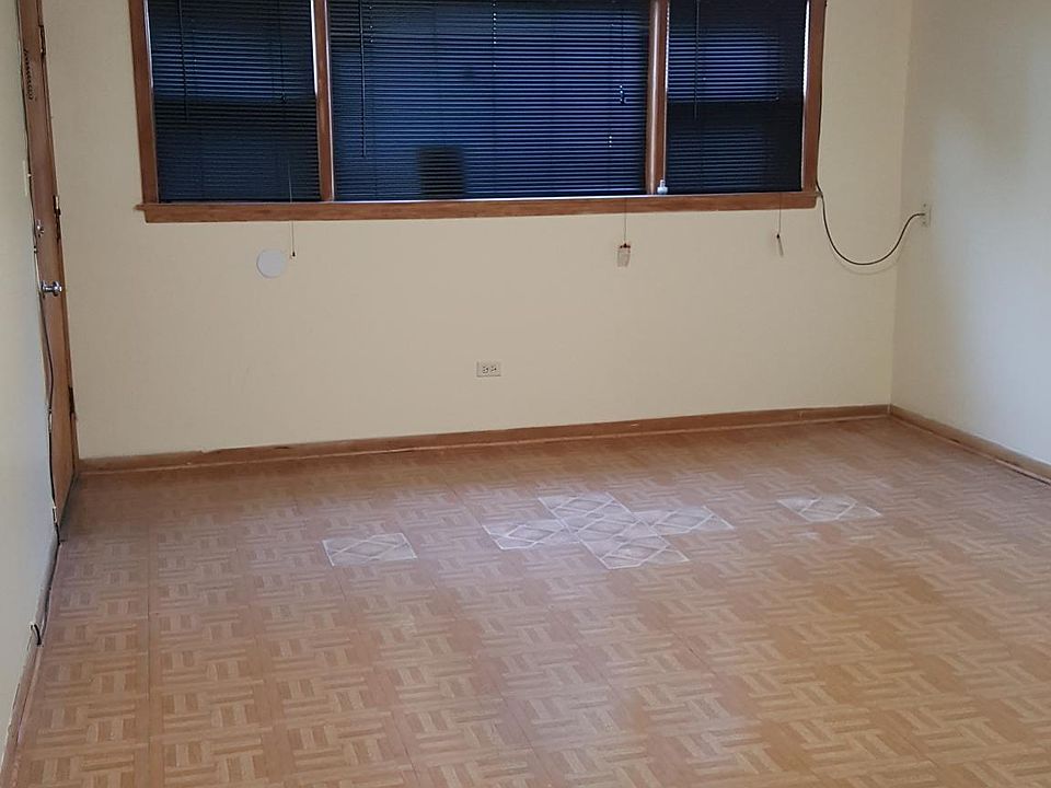 Living Room, Spacious with Laminate Flooring