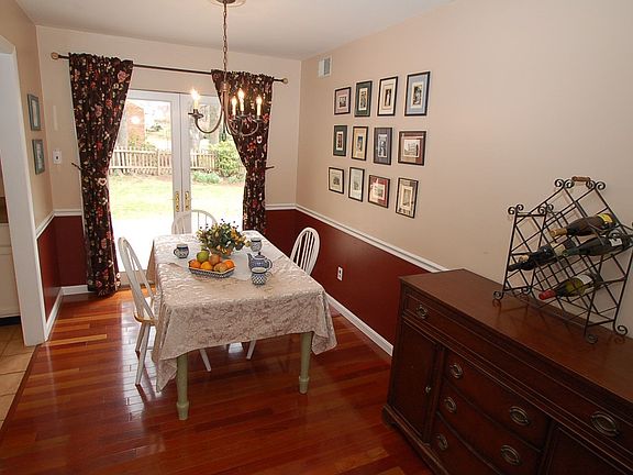 Formal Dining Room with French doors to patio and Brazillian Cherry Hardwood