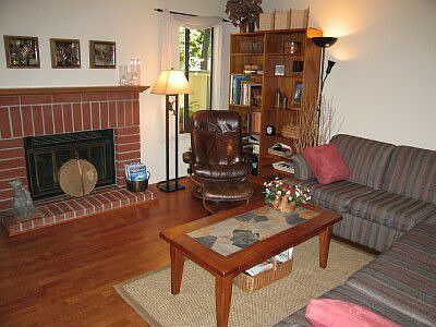 Living Room with Brick Fireplace