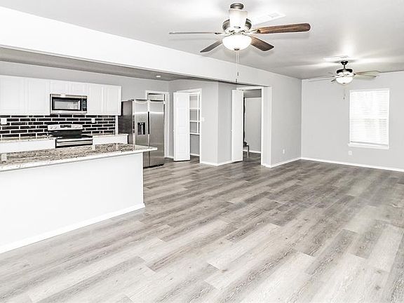Entry way to living area and kitchen