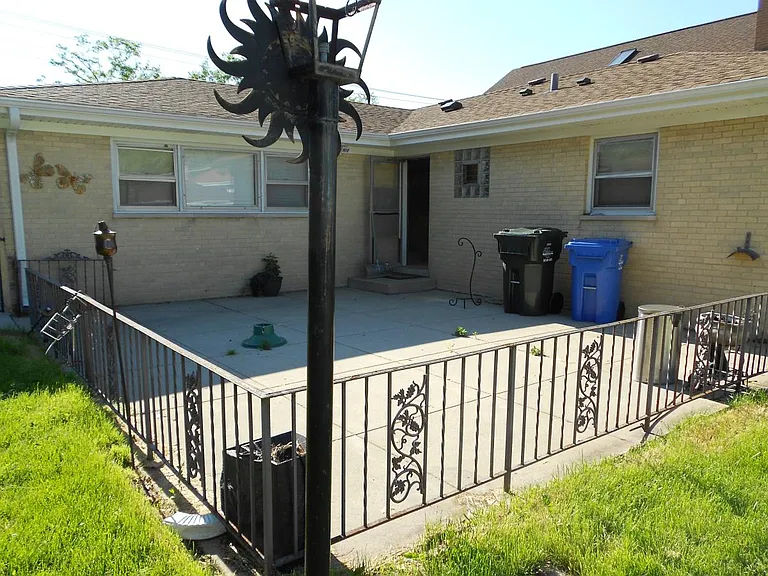 separately fenced concrete patio