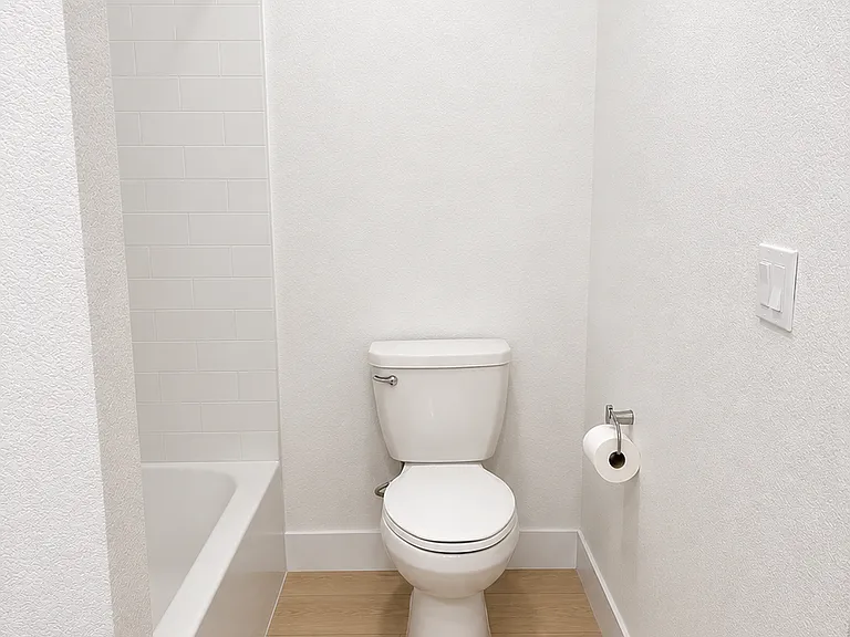 Upstairs Guest Bathroom Shower Area/Toilet