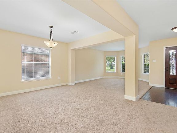 Large open formal living and dining area with many alternative options (Ex. playroom, second gameroom, office, etc)