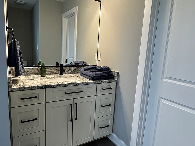 Master vanity with entrance to walk in closet