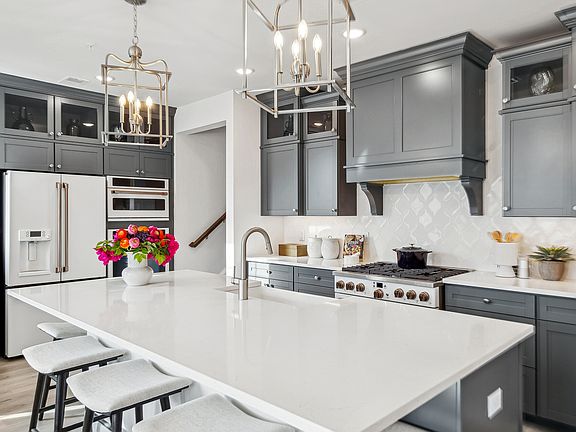Kitchen with upper glass cabinetry