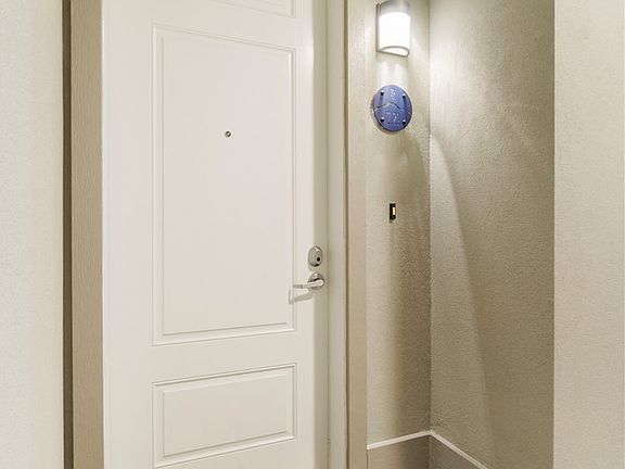 Private hallway entance, corner unit.