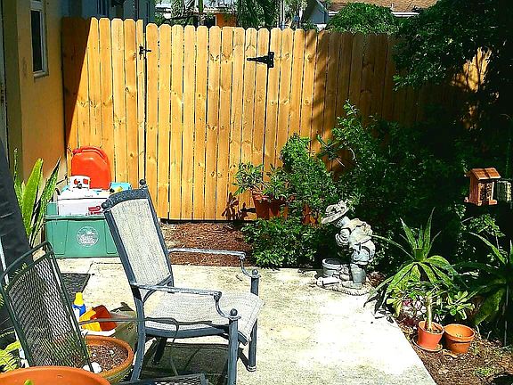 Photo only shows small portion of fully fenced backyard. Ple