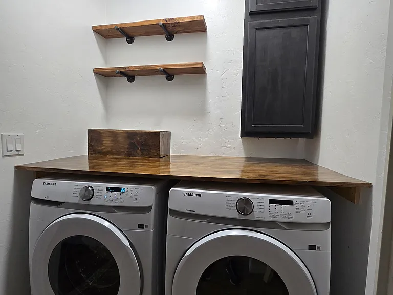 Laundry closet, is open to all living areas with brand new washer and dryer.