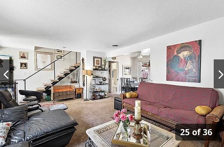 This images is of a different apartment with exact same floor plan. Living room, dinning room with laundry room and half bath down stairs next to kitchen.
