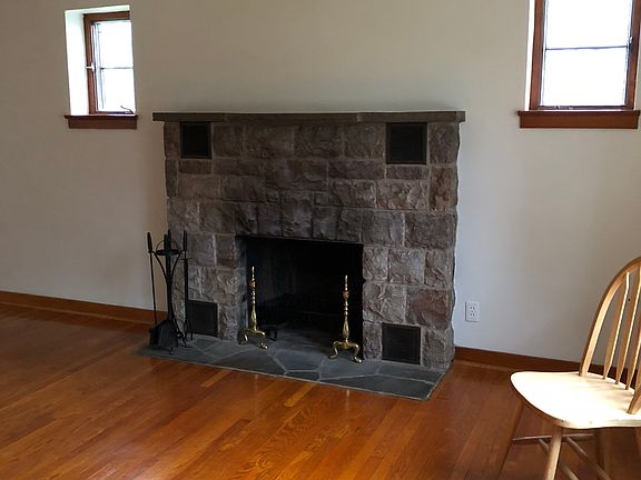 Wood burning stone fireplace