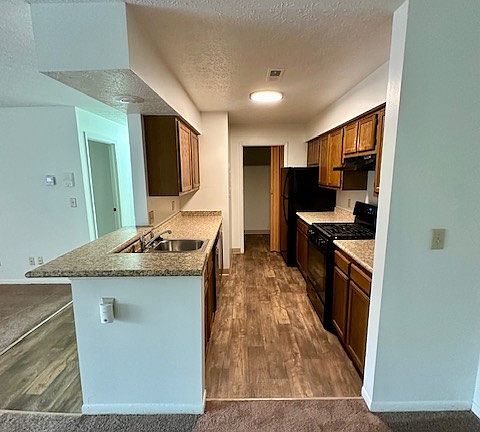 View of kitchen from dining area