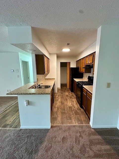 View of kitchen from dining area
