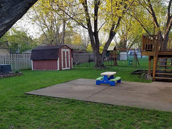 Fenced BY & gardens w/Shed