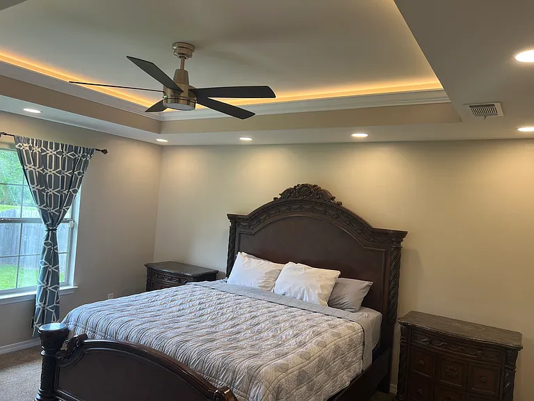 Owner Suite Bedroom with recess, lighting, as well as a coffered lighting in the Crawford ceiling