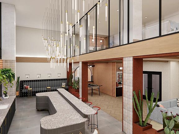 Entertain guests in the clubroom featuring a gathering space and bar area.