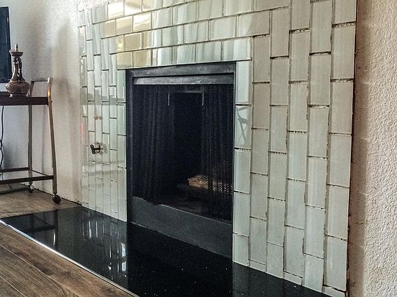 Glass Tile Fireplace w/ Granite Hearth