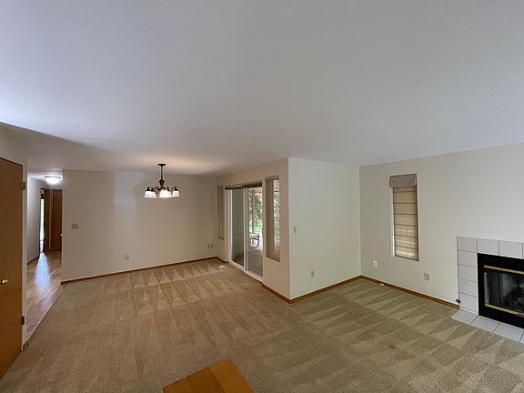 View from the entrance - family room, dining room, hallway to the bedrooms.