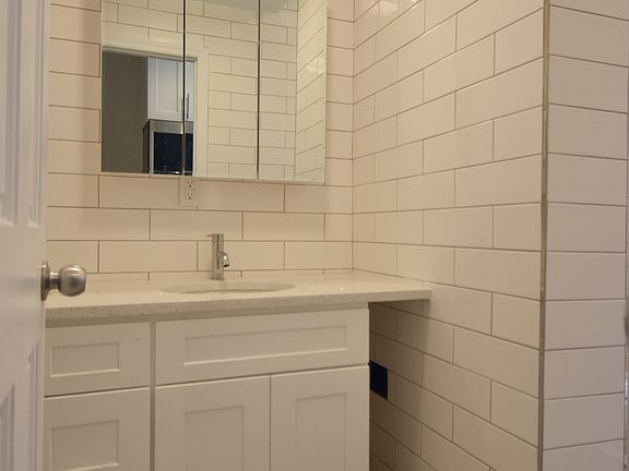 5th image of 332 E 4th St APT 32