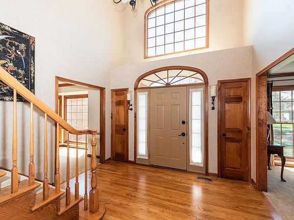 Spacious 2-Story Entry with T-Shaped Staircase.
