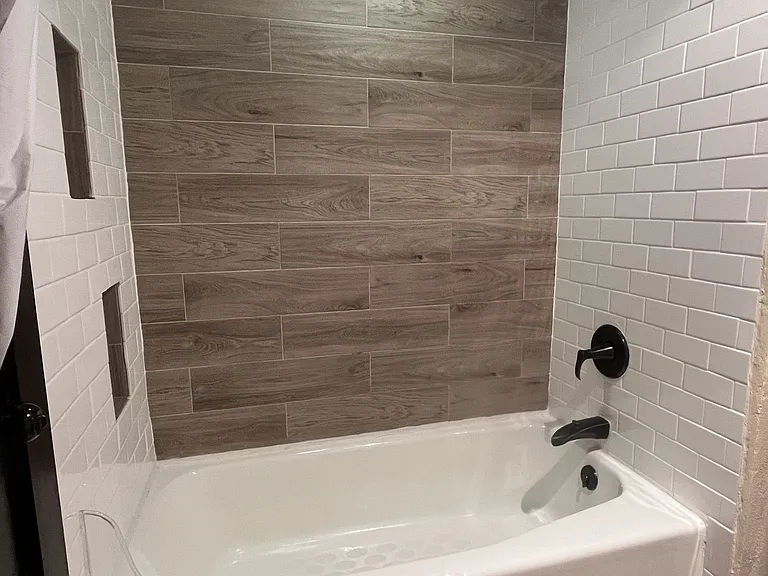Full bath downstairs. New tile!