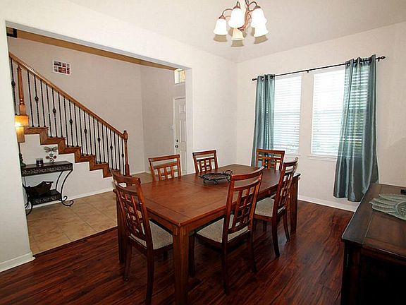 Enjoy family dinners in the formal dining room just to the left of your entrance.