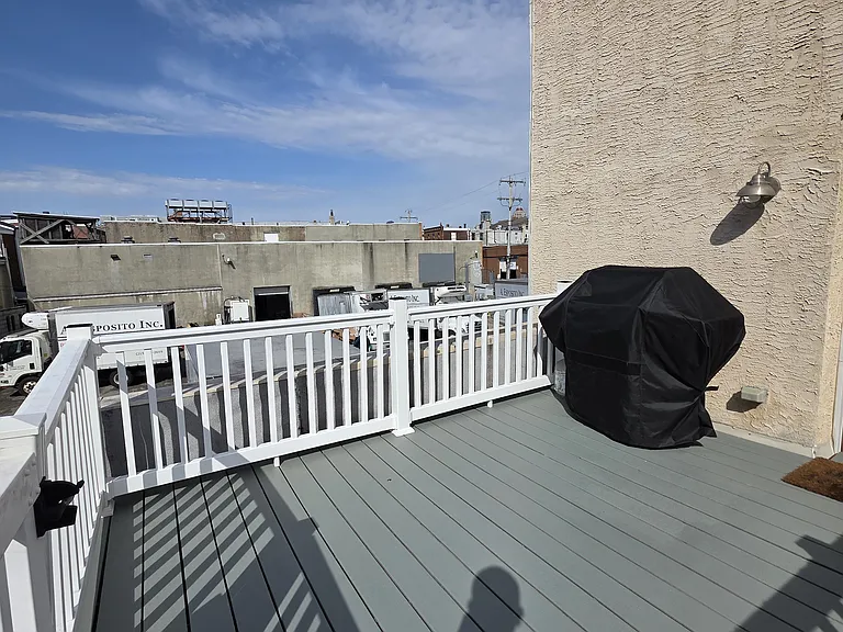 Weber propane grill. Rear 2nd floor deck with views of the city. Perfect place to hang out to relax