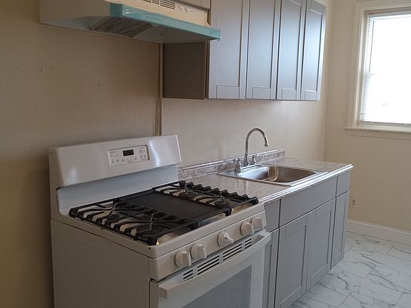 4th image of 5537 Woodland Ave