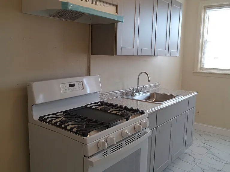 5537 Woodland Ave — Photo 3