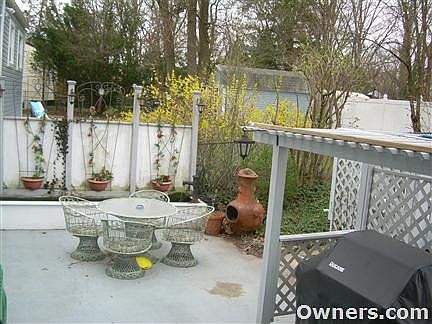 patio area with natural gas grill