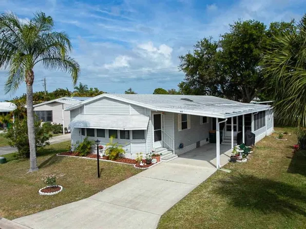 616 Amaryllis Dr, Barefoot Bay, FL 32976