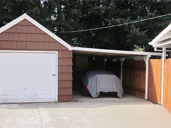 One car garage with carport. Also lots of off street parking.