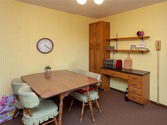 Enjoy your morning coffee in the eat-in kitchen.