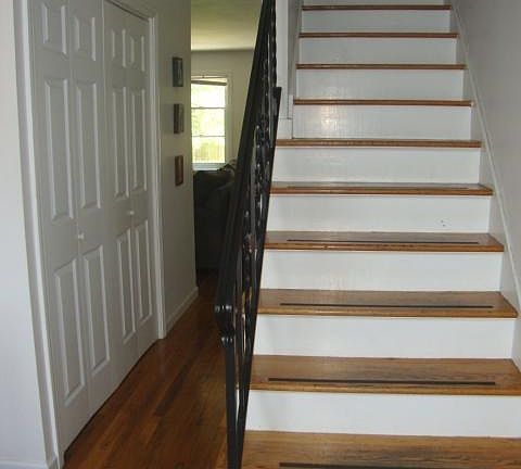 stairs leading to the bedrooms and bathoom