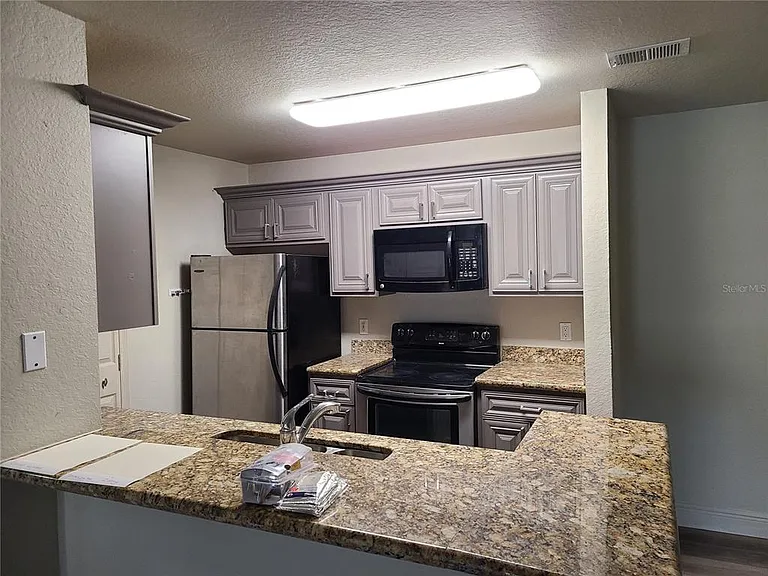 8911 Manor Loop #205 — Photo 14