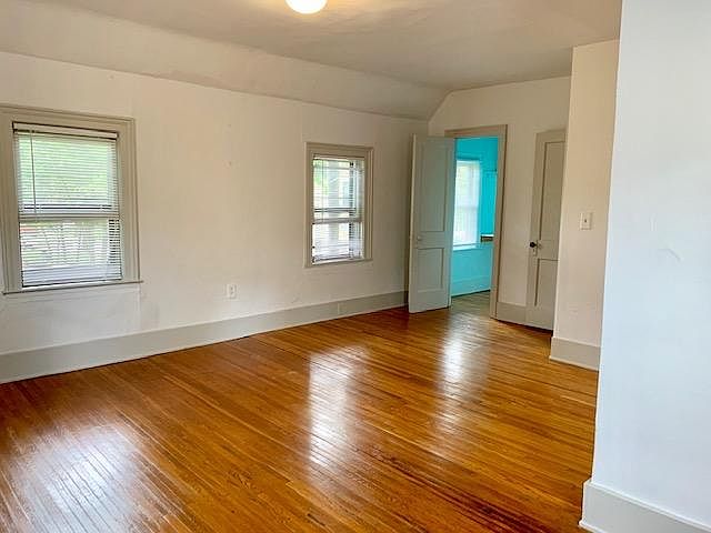 Sunny large upstairs Master bedroom with 5 windows and large walk in closet.