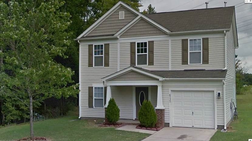 Next to large wooded area.