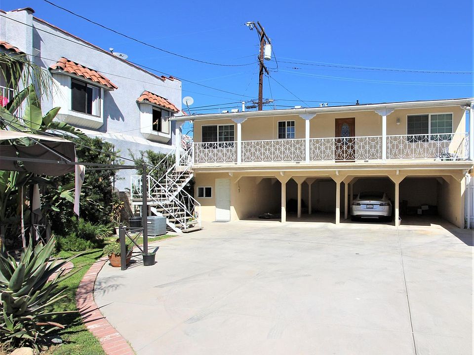 Two parking spots on left included. Laundry under the stairs.