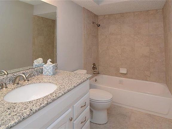 Newly updated bathroom with granite, storage closet