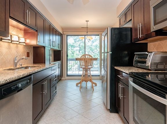 5th image of 7710 W Dempster St #302