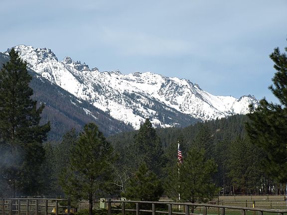 Western Rocky mountain range 2500+-feet above home protect property from heavy snow and weather that literally bounces to the east. Yes you will get snow and weather but not as much as east of this location.