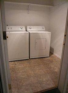 Private washer and dryer / storage room.